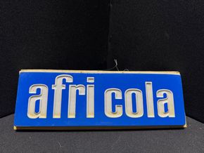 Afri Cola 3D Werbeschild - 28 x 10 cm - D um 1960