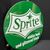 Sprite - Eiskalt herb und glitzernd frisch (Rundes Emailleschild aus dem Jahr 1968)